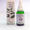 Frasco gotario y envase de cartón de la Infusión Herbal de Radal (Lomatia hirsuta), en un entorno natural rodeado de hojas.
